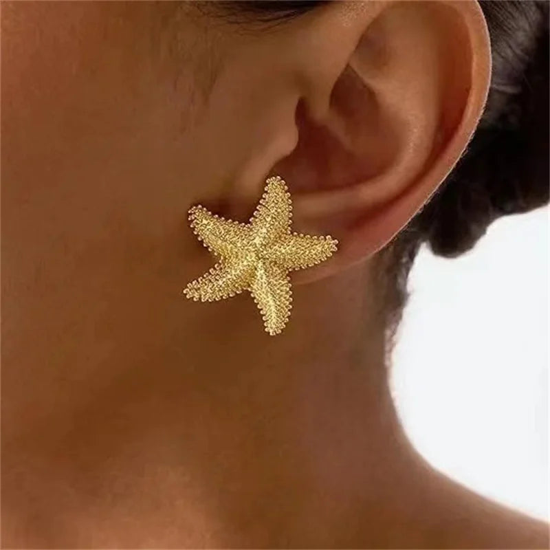 Pendientes de estrella de mar dorados